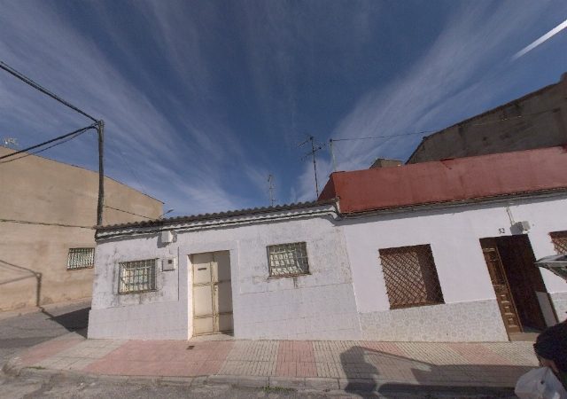 Casa en Mérida, Barriada de San Juan, calle Nuestra Señora de la Merced al que corresponde número cincuenta y ocho de gobierno, fiscal número cincuenta y dos, Mérida, Badajoz